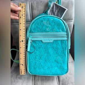 Brand new Nanette Lepore Clear  Aquatic blue Slingbag